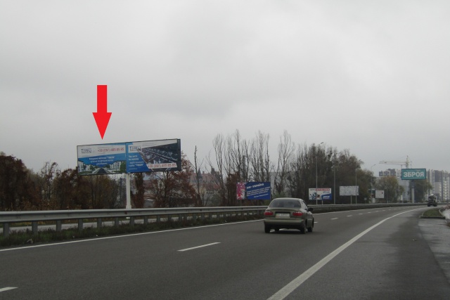 Щит 6x3,  Новообухівська траса (Дніпровське шосе), в напрямку в м. Київ, 300 м.. перед ТЦ"Мегамаркет", "Мануфактура" ,600 м. ЖК Нова Конча Заспа, лівий