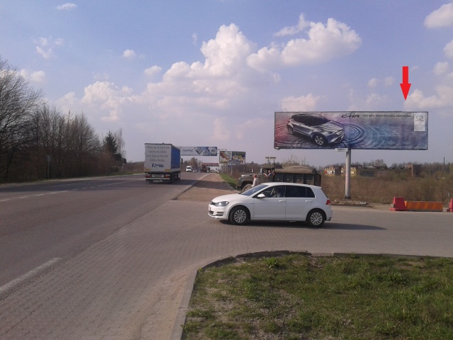 Щит 6x3,  Кільцева дорога, на перетині з Шухевича Р. вул., права (Гіпермарткет "Епіцентр", Гіпермаркет "МЕТРО", АЗС "БРСМ-нафта", в'їзд до автосалонів "BMW", "HONDA", "Volkswagen & Seat"), в напрямку Шевченка в